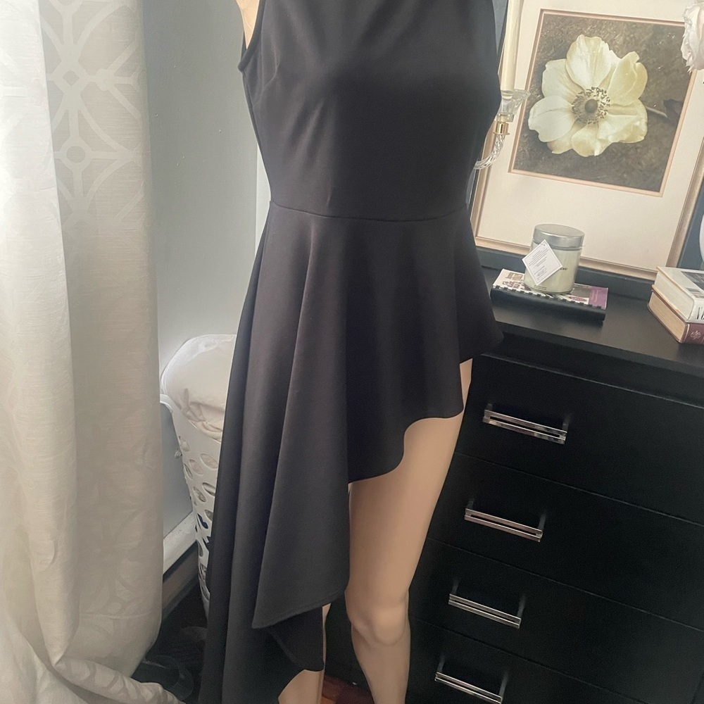 Elegant Black Asymmetrical top  size medium